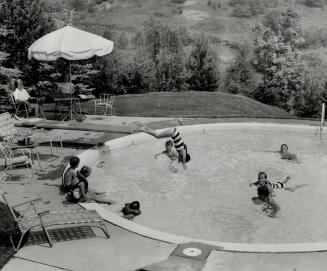 Summer in the city, what better way to enjoy it than with a pool in your back yard like the Robert Mitchells?