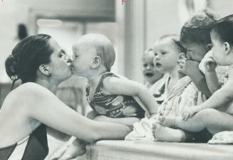 ciatation. Carol gets thank-you kiss from Tracy Craig. [Incomplete]