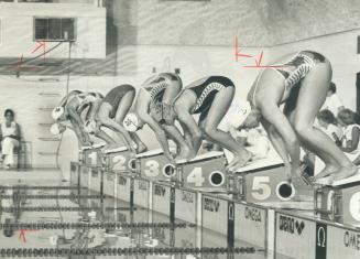 Off to record: Swimmers in 200-metre freestyle event push off at Etobicoke Olympium last night