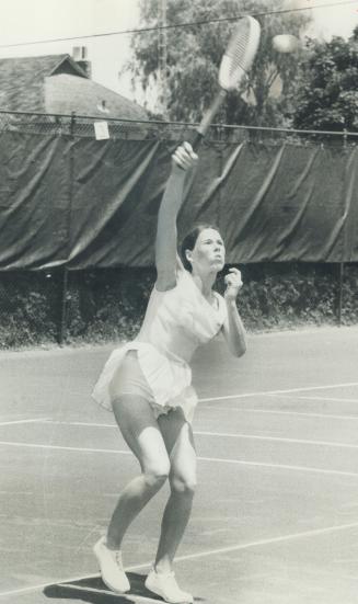 Jane O'Hara of Toronto warms up for women's singles final of Ontario Summer Games at Oshawa yesterday before going on to beat Lise Senn in Straight sets