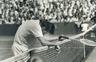 Run Ragged in men's singles final of Canadian Open Tennis Championships, a weary Roger Taylor of England rests for a moment against net. He was a 6-0,(...)