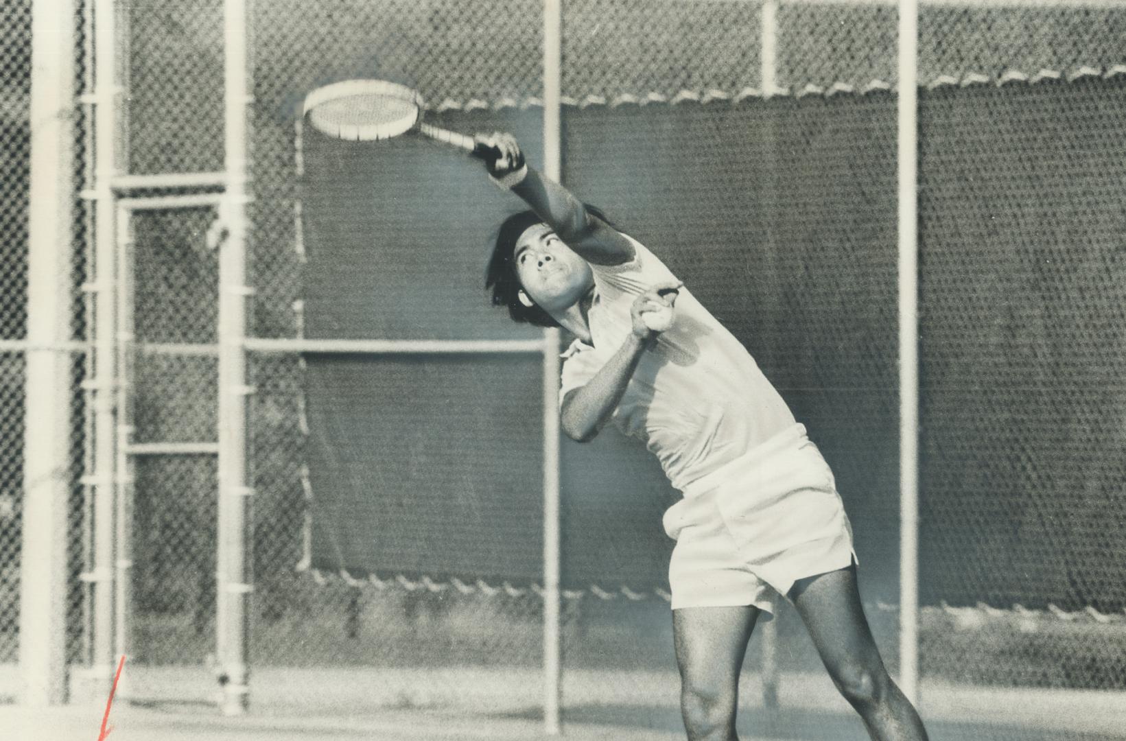 Rocketing a serve is Gus Villanueva who won two early-round matches esterday in Ontario Closed championships at Credit Valley Tennis Club. The Manila-(...)