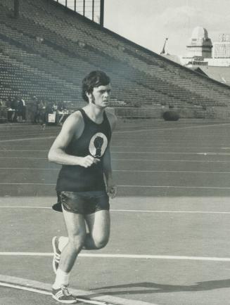 Run for the money. Bryan Beckstead, 19, Port Credit marathon runner, is in the final laps of his 100-mile run at CNE Stadium to raise cash for medical supplies for Bangladesh children