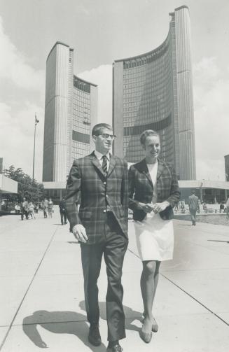 Track stars Bill Crothers and Jenny Wingerson Meldrum show off the outfits the Canadian track and field team touring Europe later this month will wear