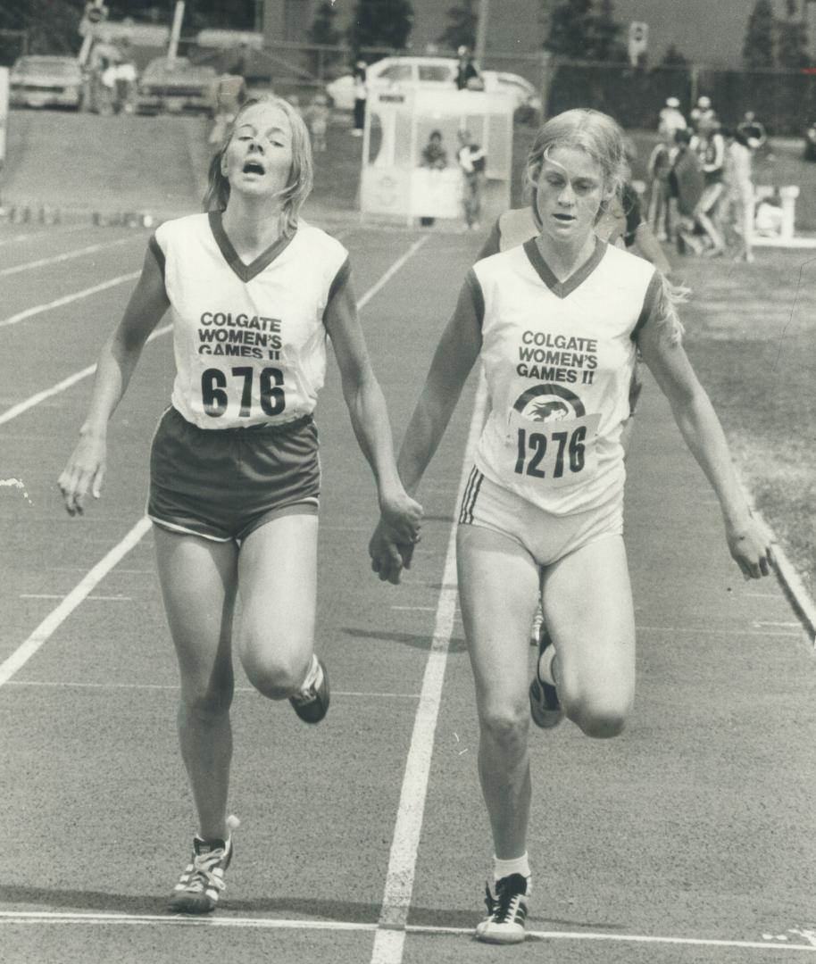 It was a close finish, but Brock's Michelle Fairburn inches out Burlington's Brenda Bowering (left) in 1,500-metre trial