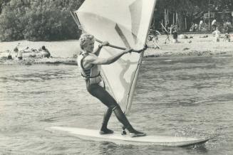 The wind's up Surfsailing is making big waves off and on the beaches of Toronto Centrespread
