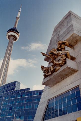 Michael Snow's gargoyle-like work The Audience, graces the SkyDome (above)