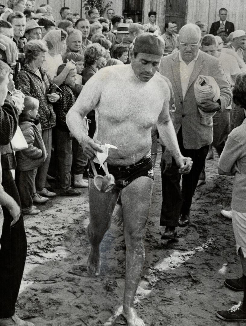 Abdel Abou Heif goes to lake. He comes from hot, hot Egypt, yet is a renowned cold water swimmer. When day-break game, the indomitable Egyptian was leading