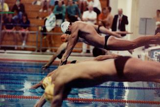 Dean Kondziolka (white cap with flag) of Mississauga AC got off to a slow start in 50-metre freestyle heat at the Summer Nationals yesterday but finis(...)