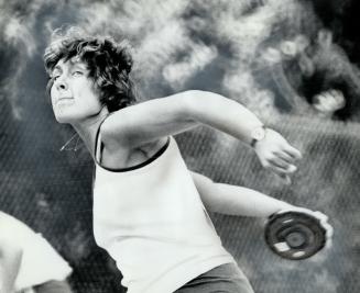 She's determined, but . . . Debbie Jaworski of Sudbury managed third place with this discus toss during Metro Toronto's annual Police Games at Birchmo(...)