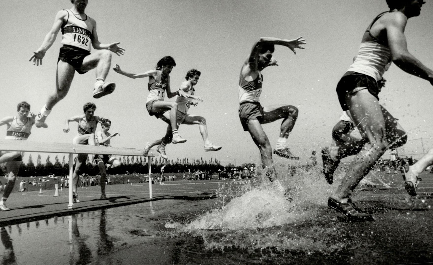 Last one in's a rotten egg. Athletes competing in the 2,000-metre open steeplechase at the Metro Toronto to Regional Track and Field championships wer(...)