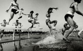 Last one in's a rotten egg. Athletes competing in the 2,000-metre open steeplechase at the Metro Toronto to Regional Track and Field championships wer(...)