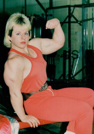 Metro's Cristina Dutkowski, 22 known in wrestling circles as Yukon Erica, flexes muscles she uses to shape a career