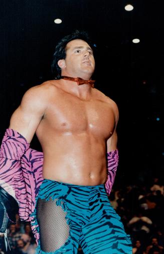 In The Star's continuing series of upclose looks at the world of pro wrestling, Greg Valentine takes on Brutus Beefcake, who's struttin' his stuff at left