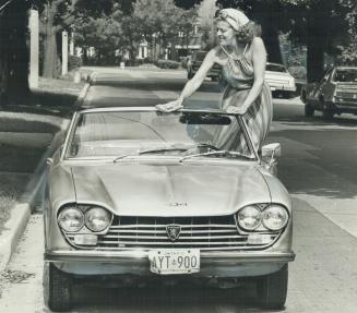 Joyce Gordon feels free in her 1968 Peugeot convertible