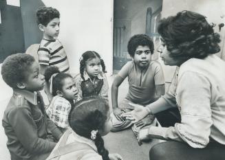 Actress-Director Amah Harris takes youngsters in hand as they rehearse for Paul Robeson benefit this Sunday in auditorium of Harbord Collegiate at 286(...)