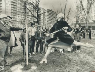 The art of planting a tree, Jumping into her task, Dutch National Ballet dancer Corrice Rykuiter wields a shovel with artistic flair as she plants a t(...)