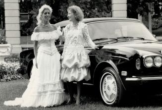 Above left, actress Lucky Rubenstein in a gown by London designer David Fielding with fashion buyer Rosalyn Cherry in a pink and white striped balloon lace dress of her own design