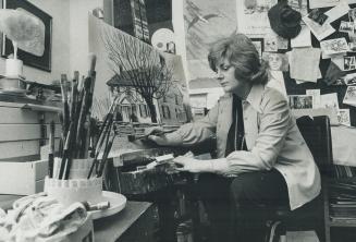 Anne Meredith Barry is shown at work in studio in her home