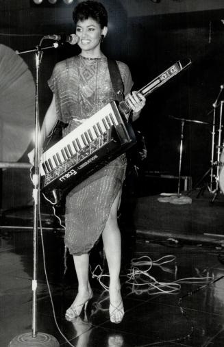 Ingrid Veerasammy: The attractive keyboard player is the lone female in the seven-member band