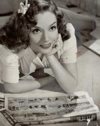 wood's rare photographs is this one of Lupe Velez, who seldom stays in one place long enough to have her picture taken