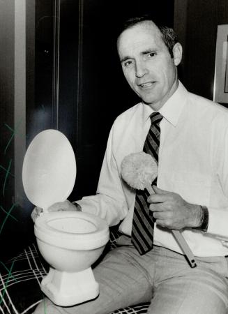 Jolly janitor: Don Aslett, author and owner of a successful cleaning company, finds humor even in cleaning toilets