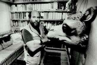 Author Lawrence Rasking surrounds himself with camel memorabilia