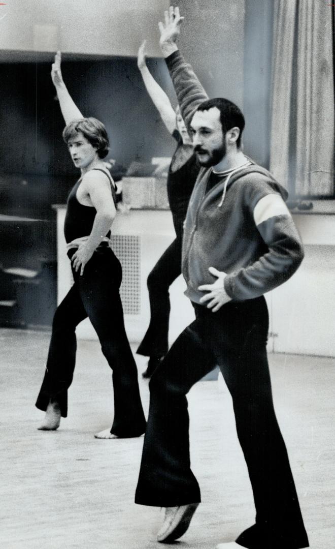 Choreographer-director Michael Bennett puts hopful hoofers through their paces at audition in the Masonic Hall on Yonge St. yesterday. The dancers wer(...)