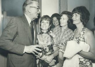 Veteran actor Walter Pidgeon drew an admiring group of women fans at the opening of the new movie, The Neptune Factor, this week at the Imperial six theatre. [Incomplete]