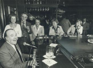Ken Hewitt always draws a crowd around his piano at the S