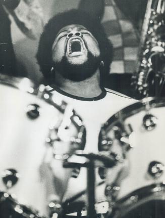 Waiting game: Fans sat while drummer Buddy Miles watched World Series on television