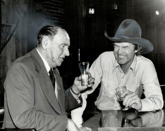 Swapping yarns: Nashville's outlaw songwriter Billy Joe Shaver wasn't in town for more'n five minutes 'fore he got to swappin's yarns with Concord Tavern regulars like Harry Light (left)