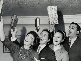 Singing the praises of their gift-wrapping are opera stars Sheila Piercey, Alexander Gray, Arlene Meadows and John Arab, Presents are for benefit cock(...)