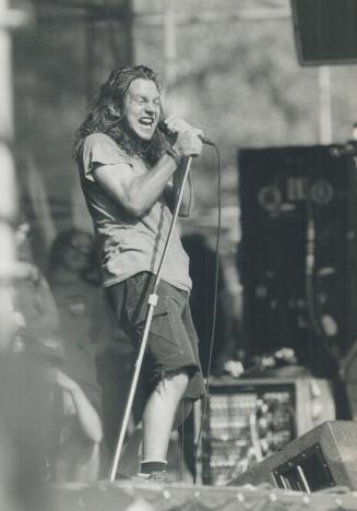 Eddie Vedder of Peari Jam, one of the hottest of the new Seattle grunge acts, and Miki Berenyi of Briitish quartet Lush were among performers at Lollapalooza '92 in Barrie yesterday