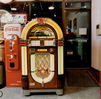 Whirl Away: The hi-tech One More Time from Wurlitzer, left, plays 100 selections and is base on Model 1015 from 1946, about $7,000 at Juke Box Saturday Night and The Right Stuff