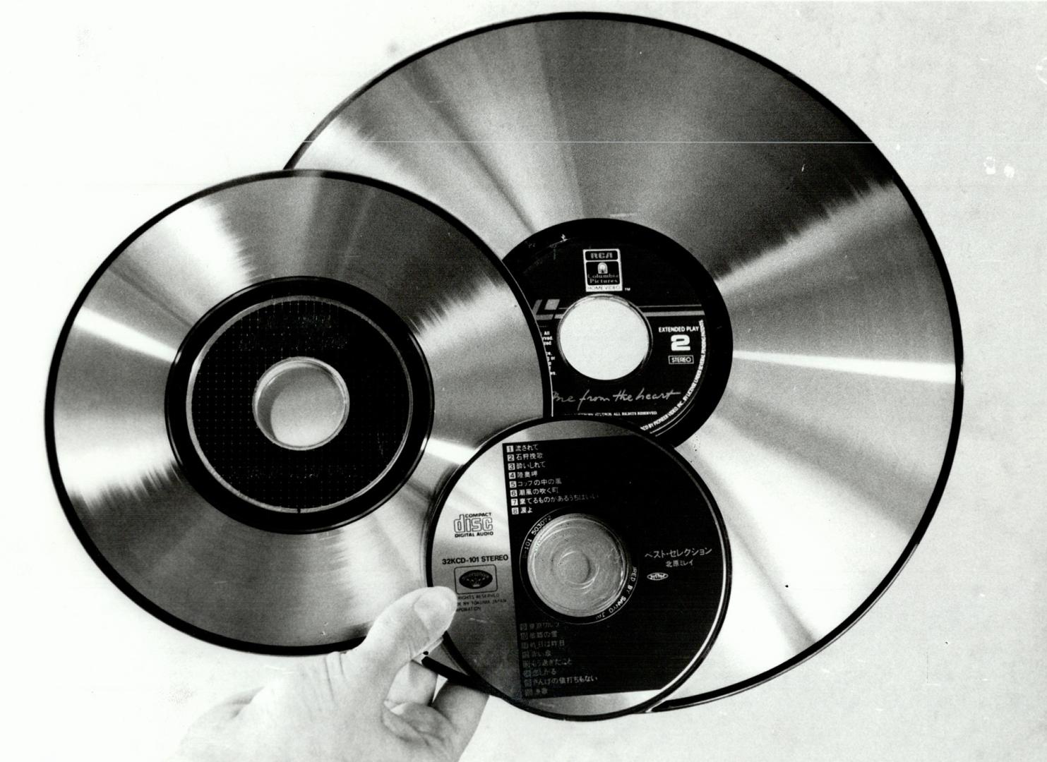 Laser discs: Played on Pioneer Model CLD-900, the compact disc produces great sound, the 20-cm size holds 20 minutes of music videos and the 30-cm disc holds a two-hour movie