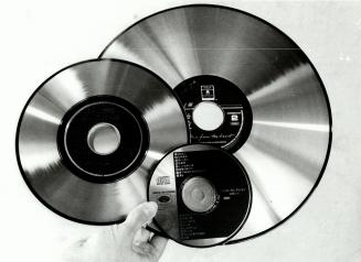 Laser discs: Played on Pioneer Model CLD-900, the compact disc produces great sound, the 20-cm size holds 20 minutes of music videos and the 30-cm disc holds a two-hour movie