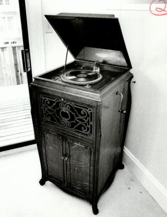 Warm corner: The polished oak of this gramophone brought from Chicago lends warmth to the Landecker living room