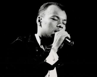 Natty gift: Hugo's fallout proved no match for the infectious dance rhythms of Roland Gift and Fine Young Cannibals at a soggy Kingswood Music Theatre Friday night