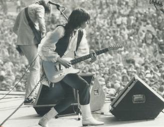 Chrissie Hynde of The Pretenders rips out a tune for the 50,000 New Wave fans