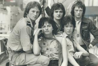 In Toronto yesterday to talk to Peter Goddard about his new career, former Bay City Roller Ian Mitchell (second from left) introduced members of his n(...)