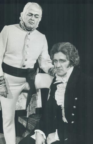 left to right: Don Garrard, foot on bench (Prince Gremin), Victor Braun, sitting down (Eugene Onegin)