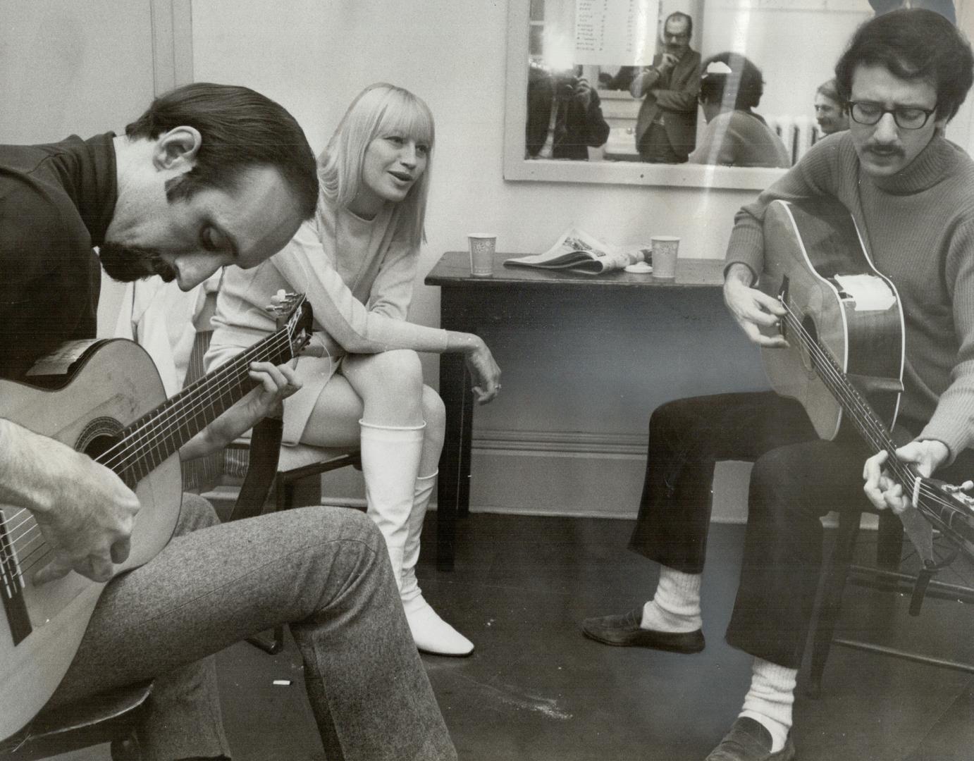 Peter Yarrow, Mary Travers and Paul Stookey warm up in dressing roo before their show at Massey Hall last night