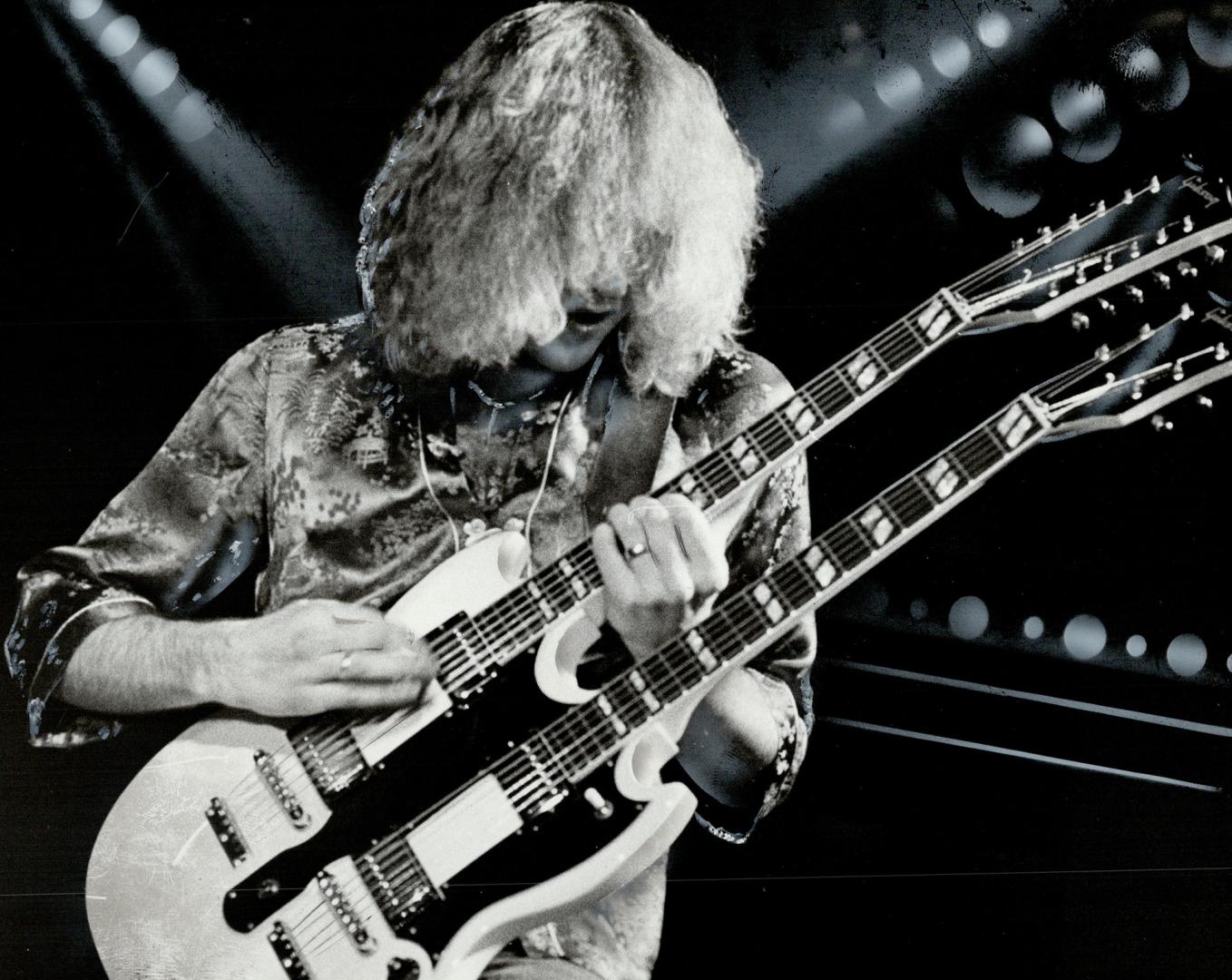 Rushin' along. Rush brings its heavy-metal rock concoctions to Maple Leaf Gardens tonight at 7, featuring Alex Lifeson on the twin necked guitar. Tick(...)