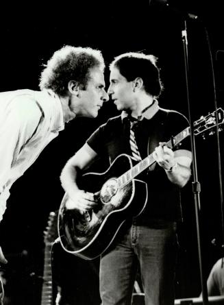 The night the '60s came back. Simon and Garfunkel's long-awaited concert at the CNE Stadium last night packed in 35,000 fans - at least half of whom w(...)