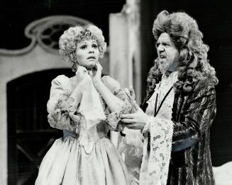 Rosina (Judith forst) cries for Dr. Bartolo (Don McManus) in Rossini's Barber of Seville