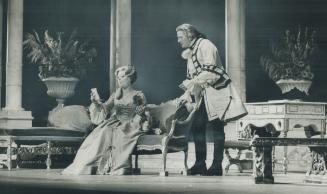 Stage production of The Marquise, with Glynis Johns (seated) and a male actor standing behind h ...