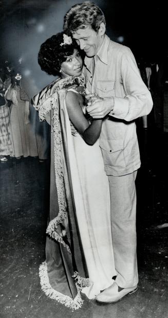 The new Miss Caribana, Marlene McDonald, takes her first dance with Peter O'Toole at last night's Caribana Ball at the Royal York Hotel. The actor is (...)