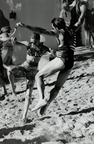 Linda Kash and Henry Czerny hit the beach