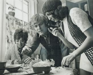 Cast members of Spring Thaw Rosemary Radcliffe, Bob Jeffrey and Nicole Morin share home-cooked meal